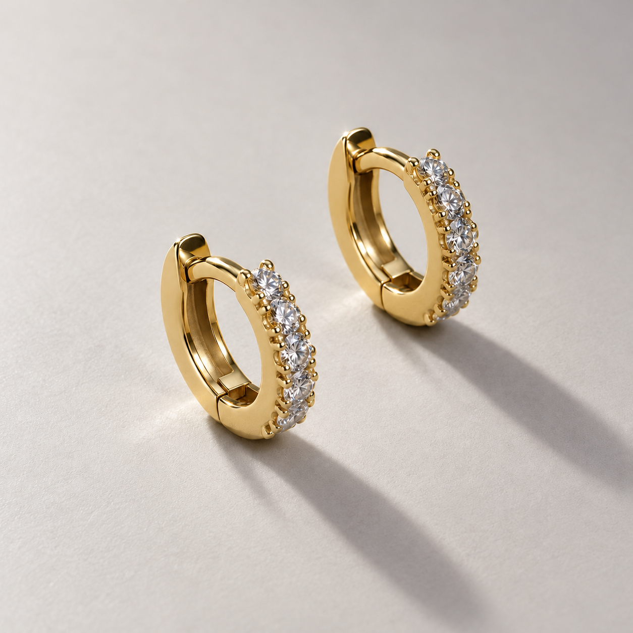 Polished Yellow Gold Diamond Huggie Earrings.png