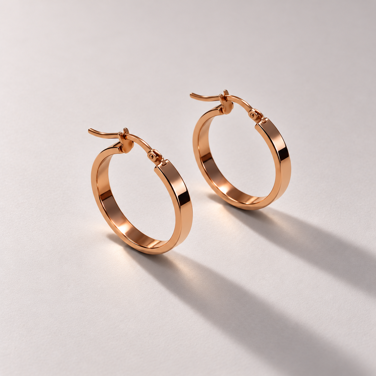 Polished rose gold hoops-2.png