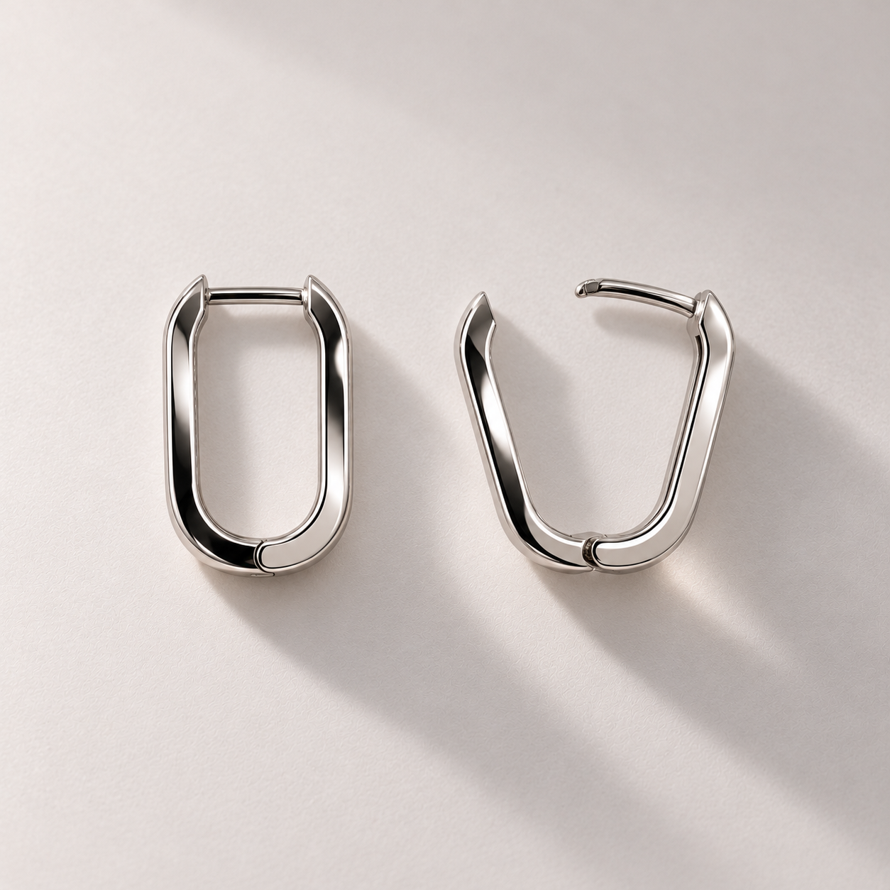 Polished white gold hoops, open and closed.png