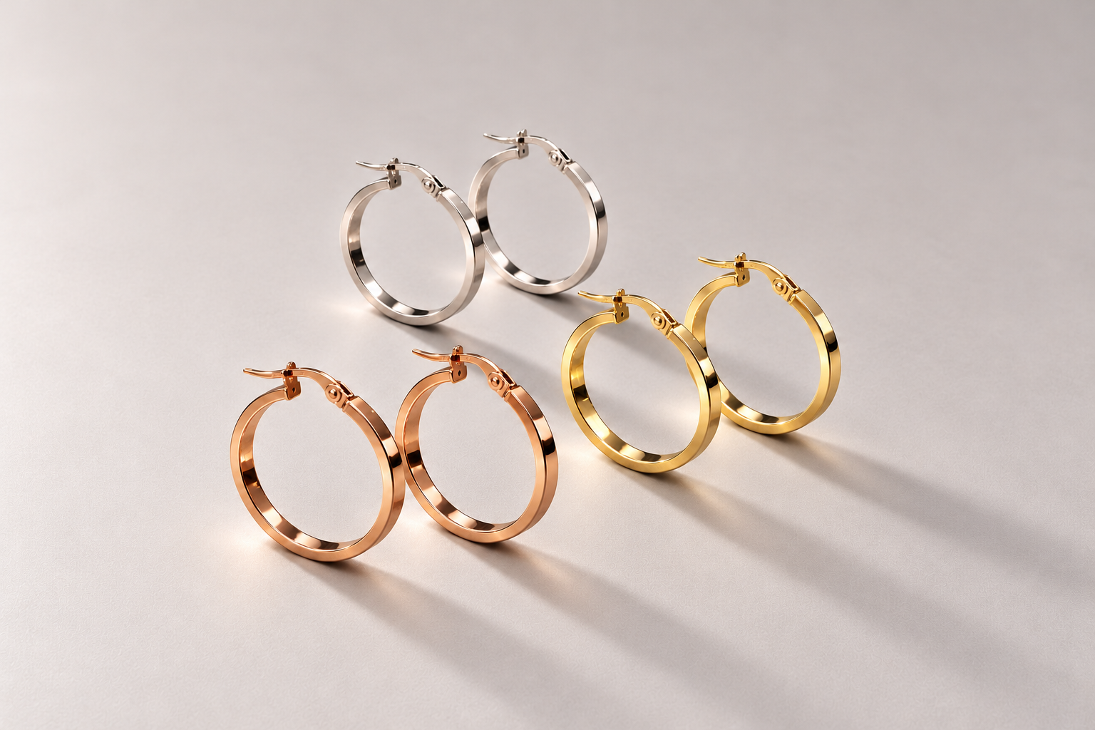 Six Gold Hoops on Soft Greige.png