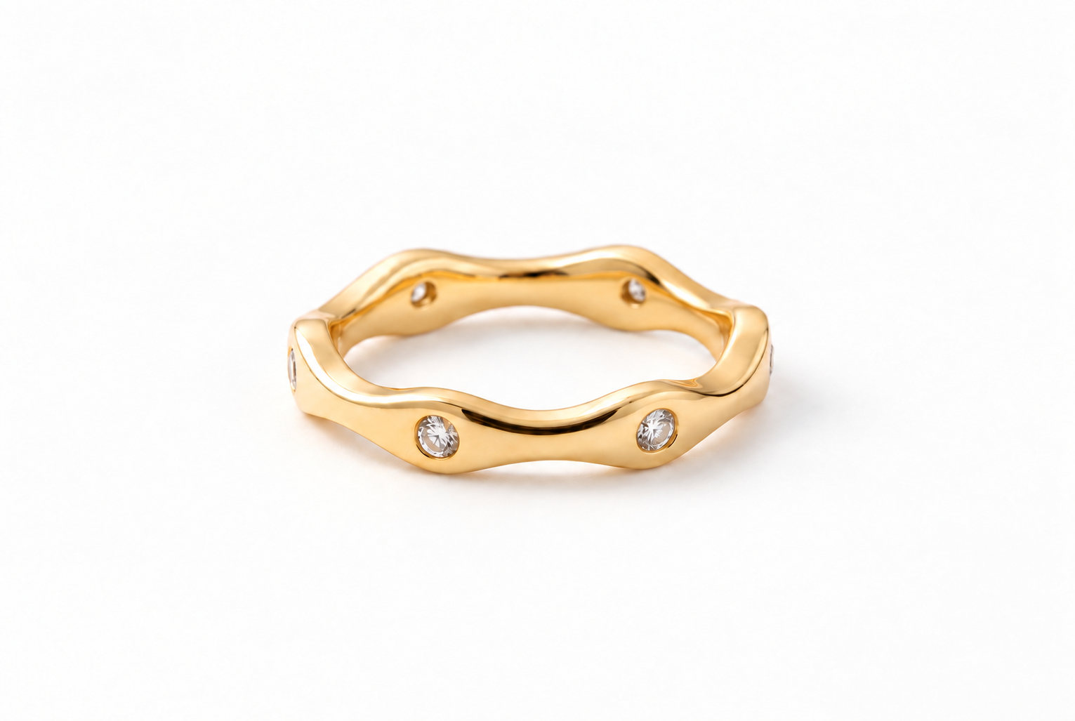 Yellow gold ring with diamond backing holes.png