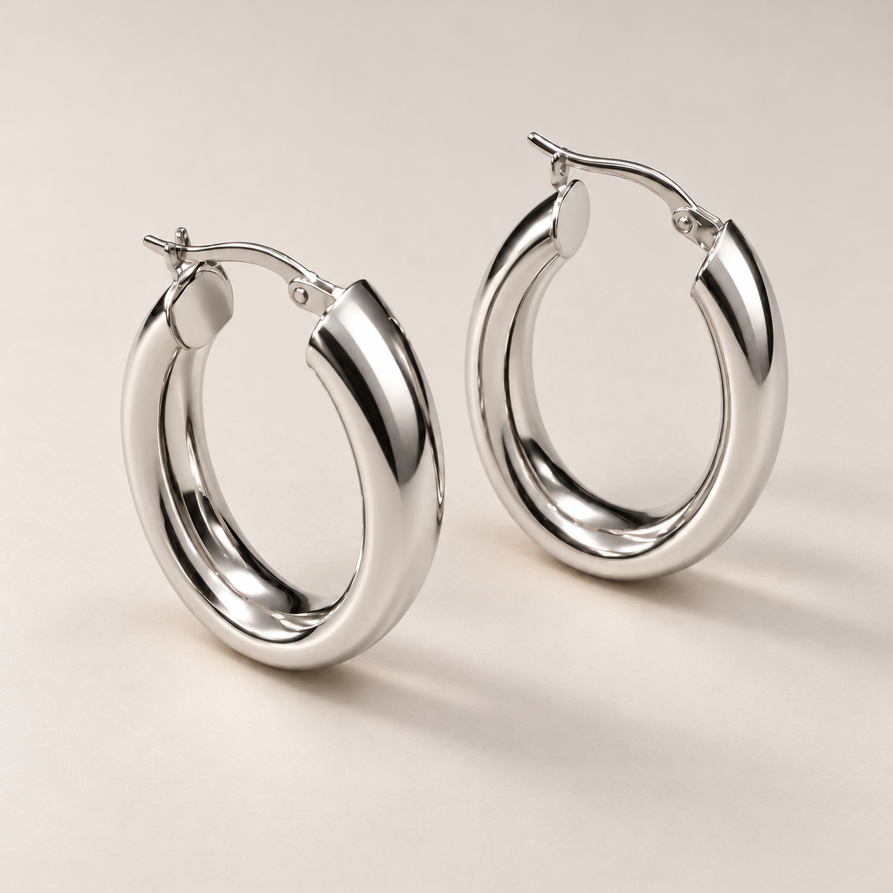Polished white gold hoop earrings-3.png