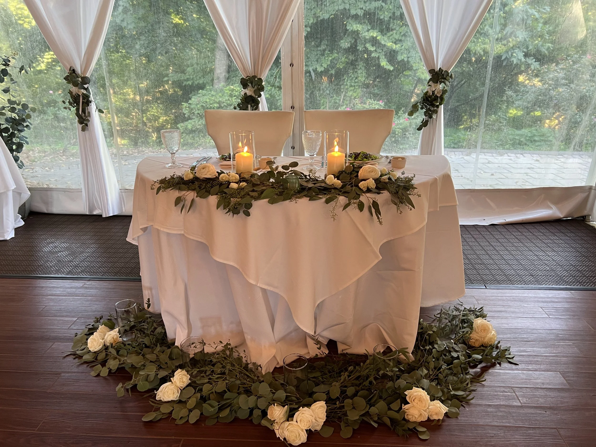 Sweetheart table flat lay with vases.jpg