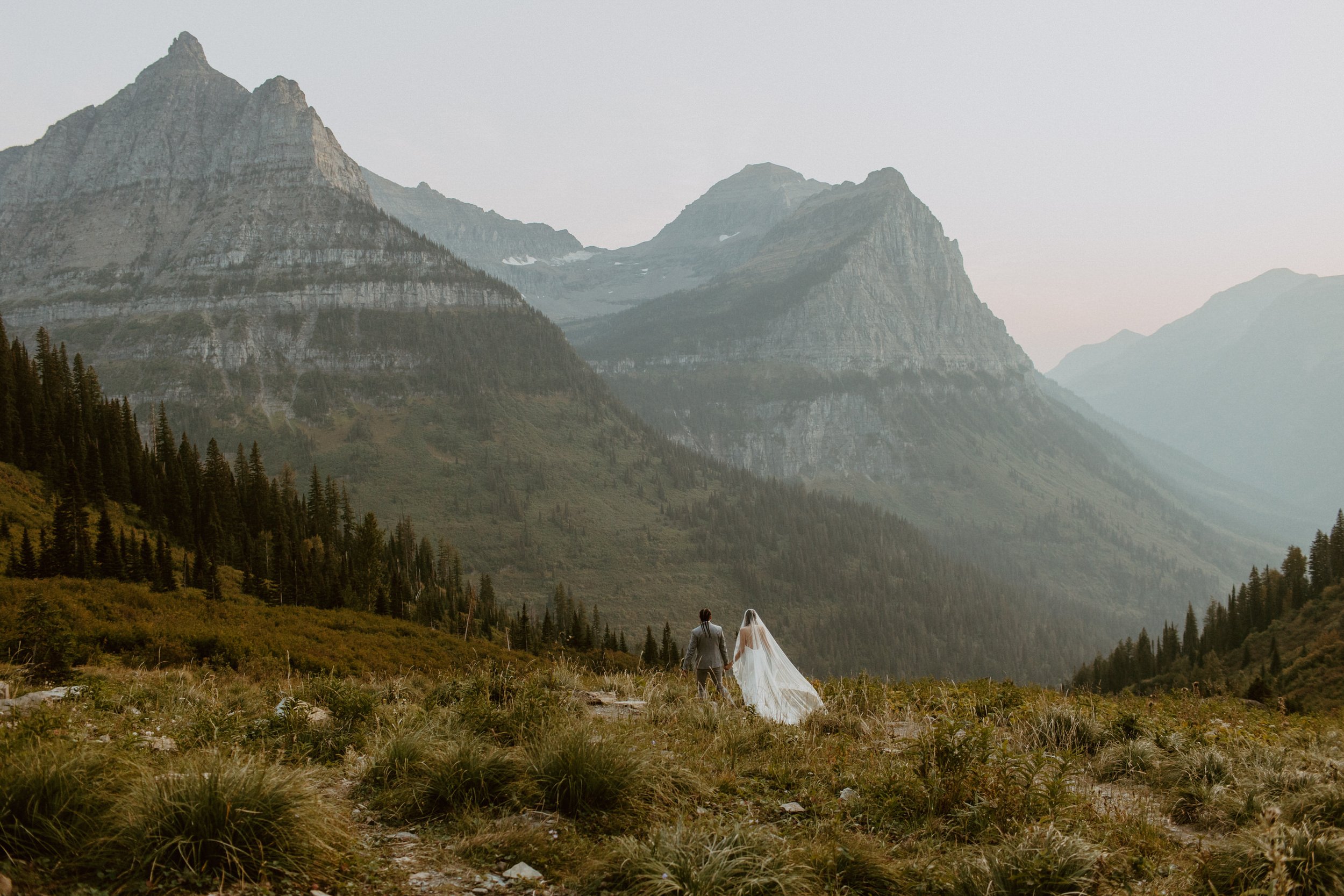 Glacier National Park Elopement couple walking in Glacier