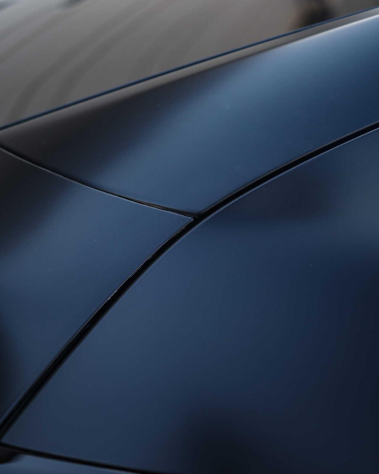 Wrapped and tucked film edge with no lifting
