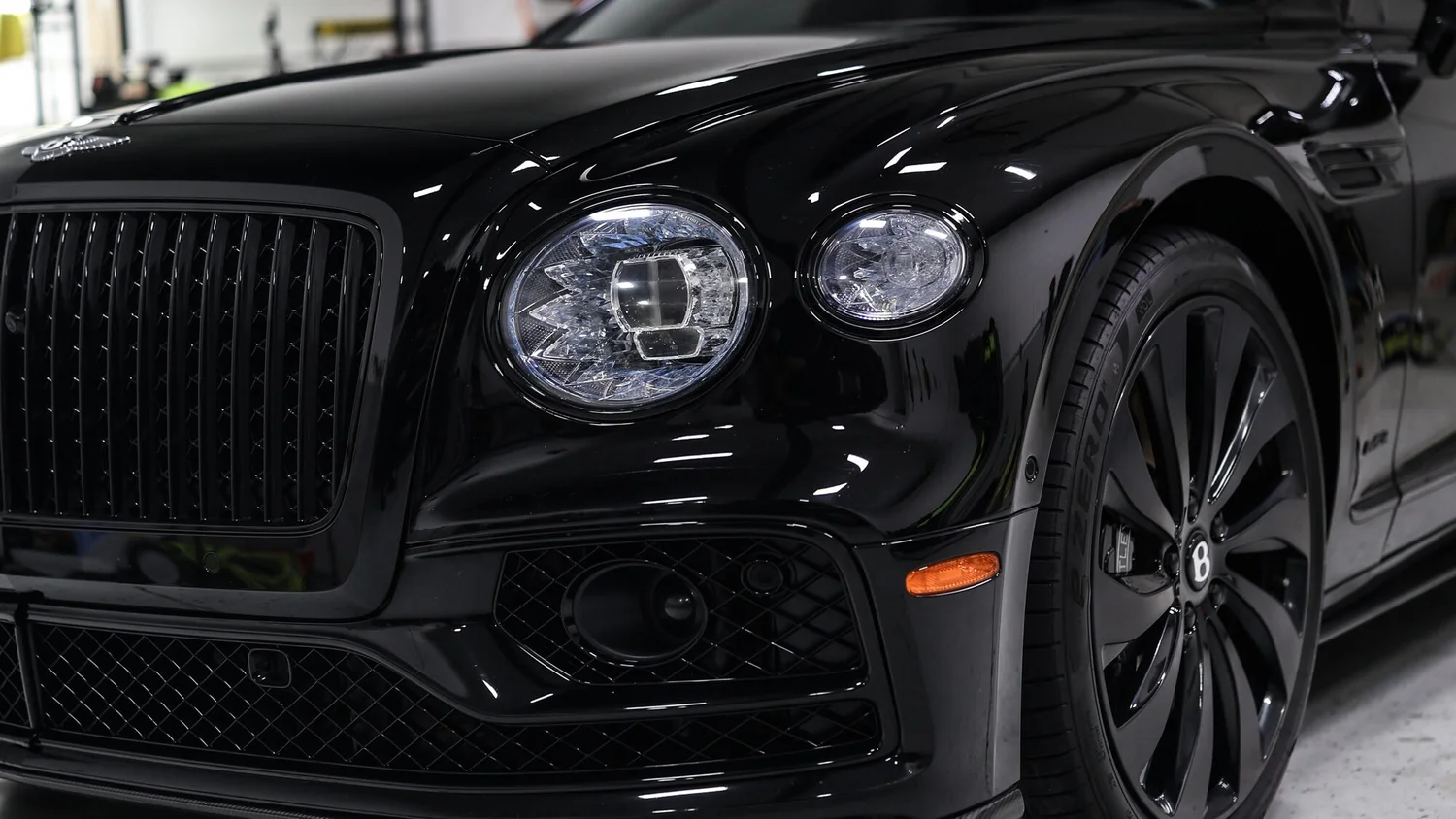 Black Bentley Flying Spur with a ceramic coating, deep wet look gloss, at Ascension Automotive in Milford, Michigan