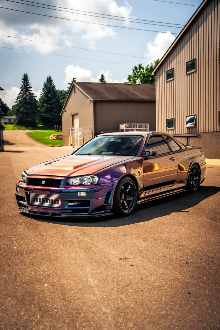 Midnight purple Nissan Skyline R34 with ceramic window tint at Ascension Automotive