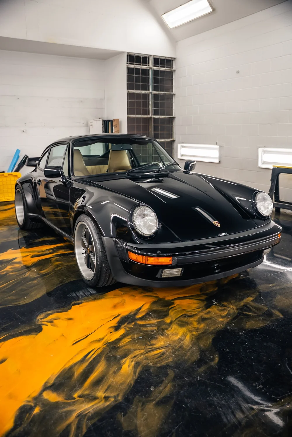 Black Porsche 911 with paint protection film