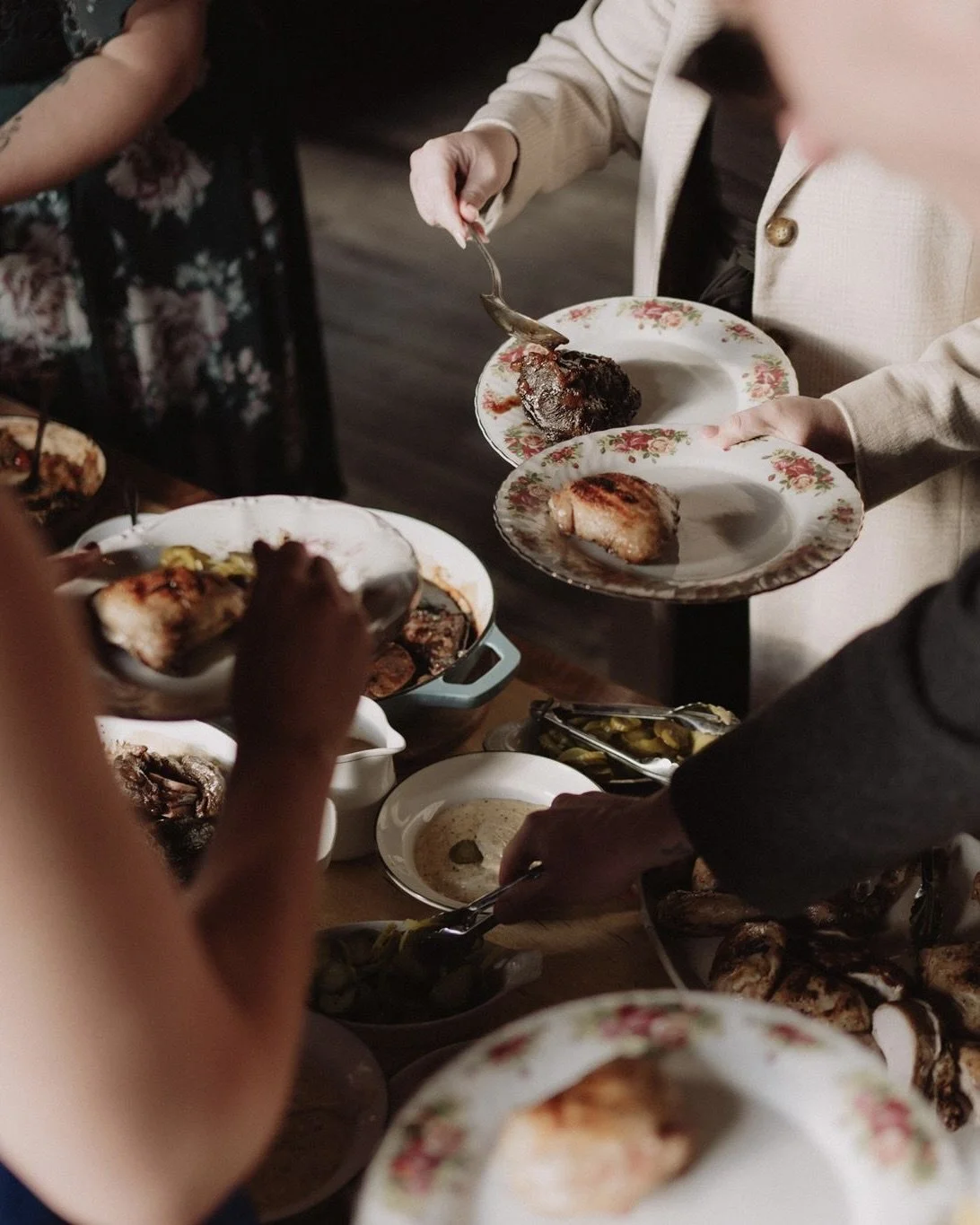 image of wedding guests eating food on a table from catering service
