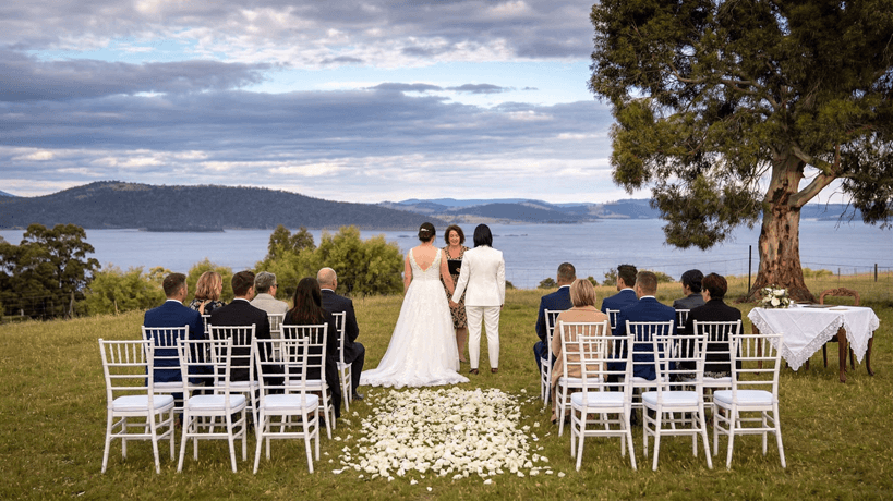 a wedding overlooking a lake