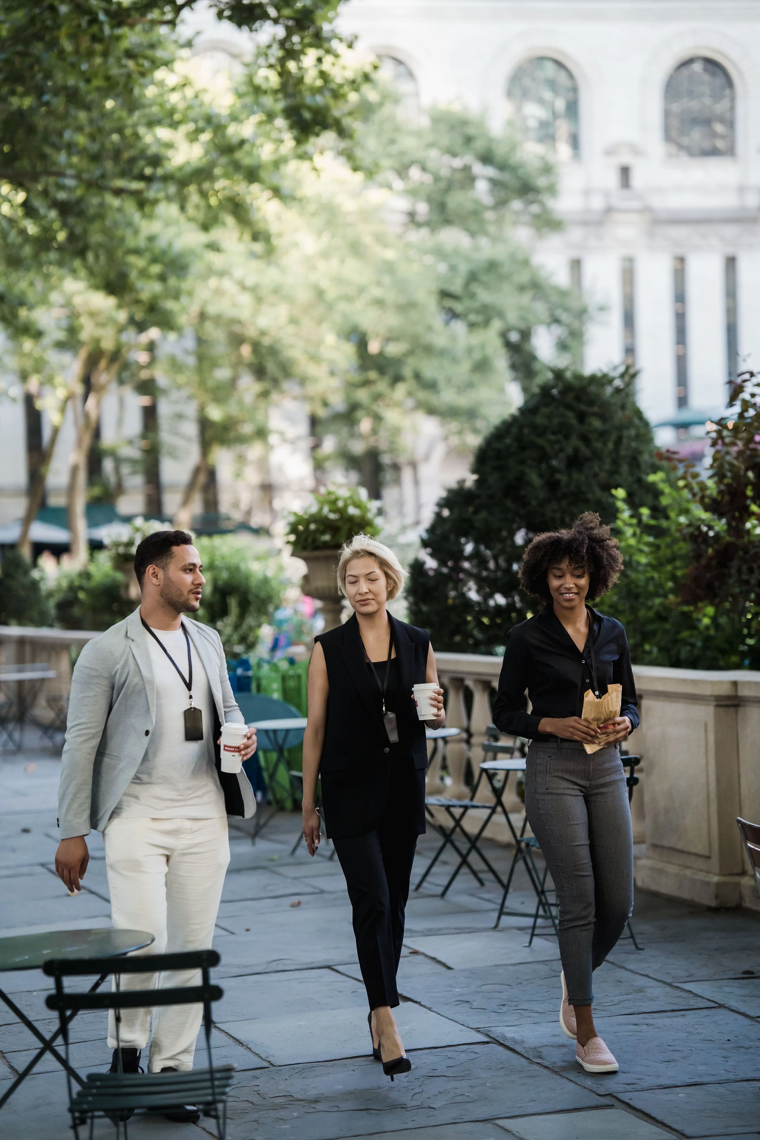 Coworkers walking to a meeting.