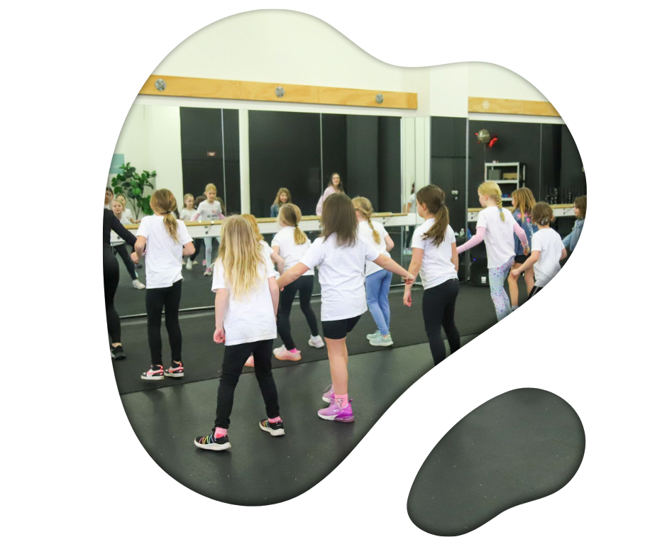 New Canaan kids enjoy a Taylor Swift dance class, happily following their teacher’s movements and instructions