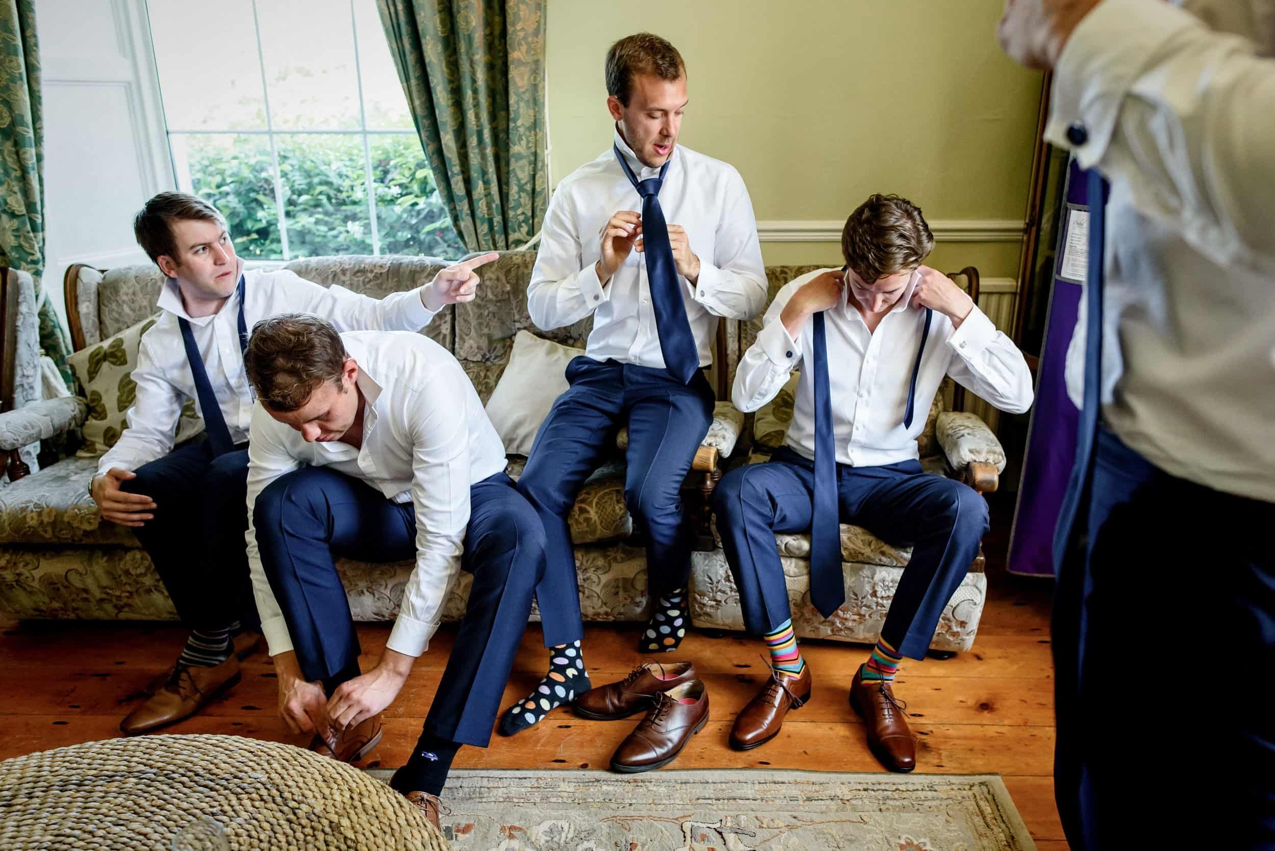 Groomsmen getting ready for Rhosygilwen wedding. Image by Real and Rich Photography.