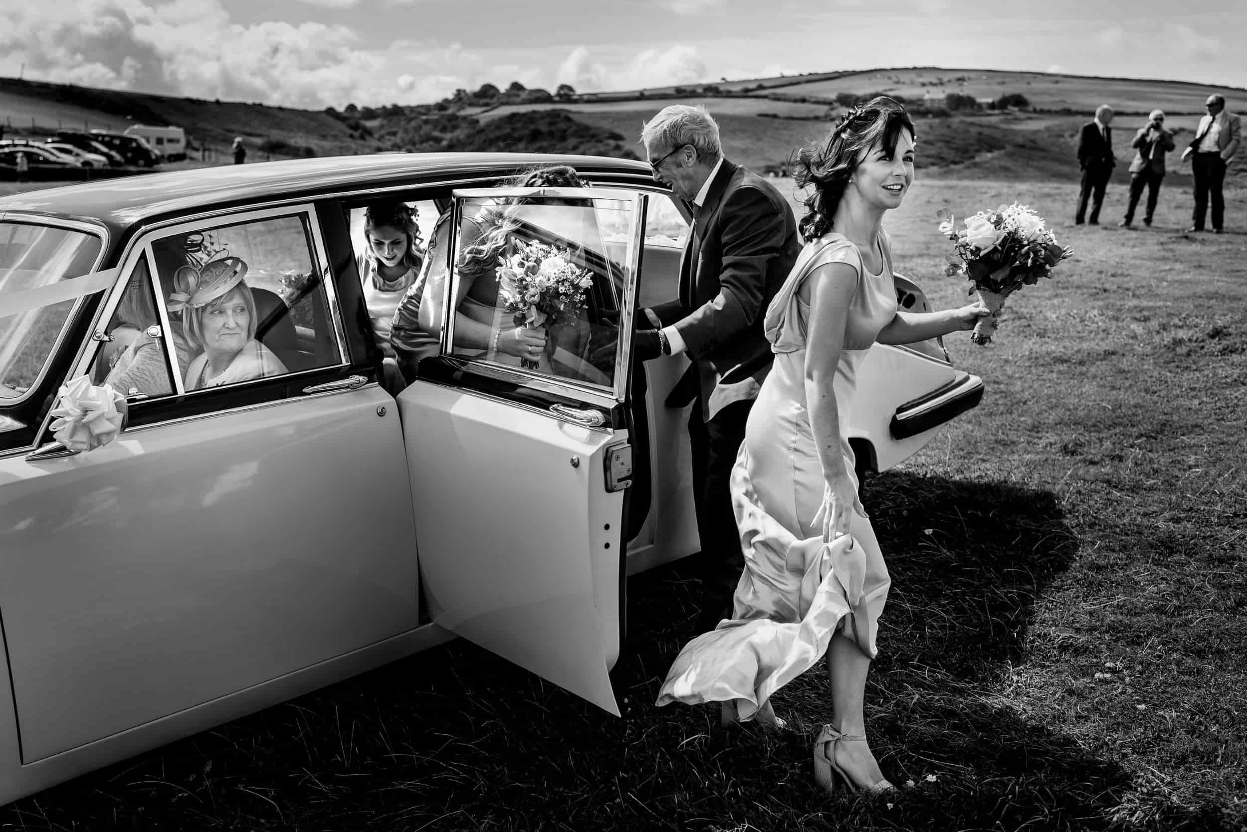 Arrival at Mwnt Church wedding photos.
