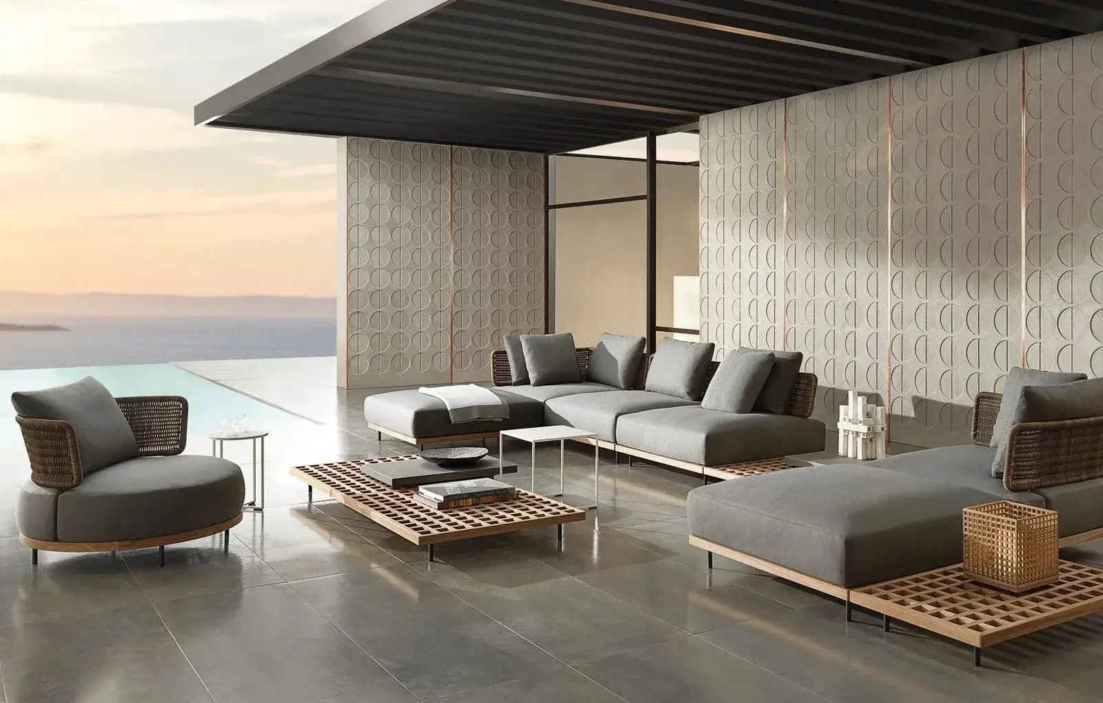 Minotti Quadrado outdoor sofa system designed by Marcio Kogan, featuring modular seating and contemporary design, supplied by Abitalia South Coast in Dorset, Hampshire, and Surrey.
