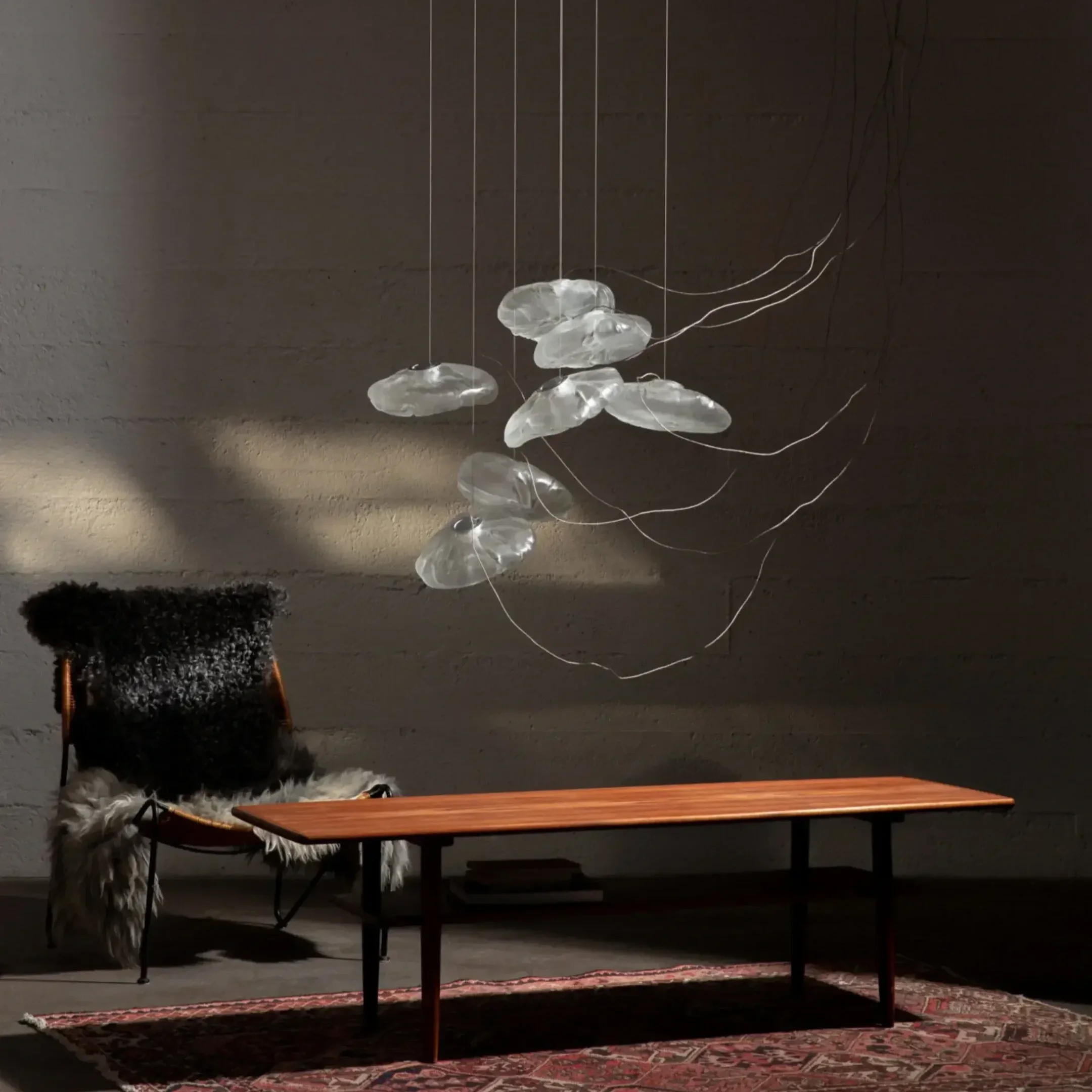 73 Series Pendant Light by Bocci creating ambient lighting in contemporary interior.