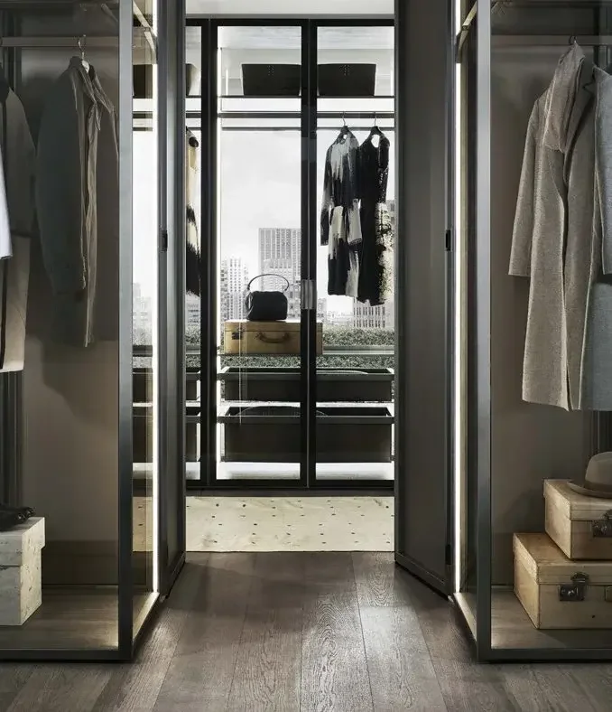 Rimadesio Cover wardrobe system with glass doors and integrated lighting, supplied by Abitalia South Coast in Dorset, Hampshire, and Surrey