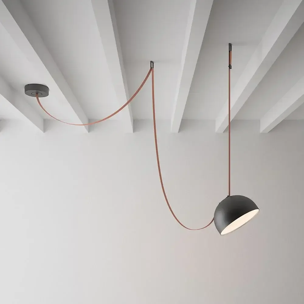 Vibia Plusminus Semispheres Pendant Lamp with canvas or leather belt design and metal semisphere shade, supplied by Abitalia South Coast in Dorset, Hampshire, and Surrey.