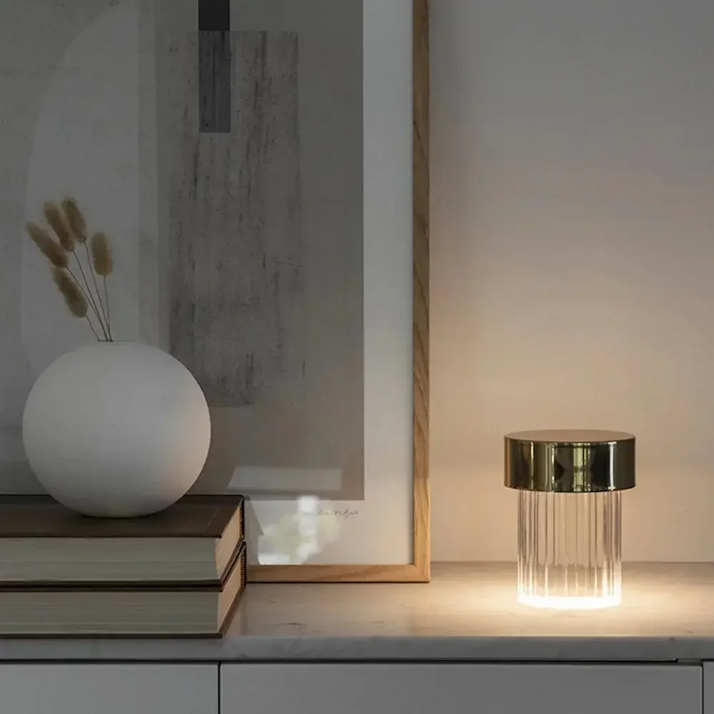 Flos Last Order Fluted Portable Table Lamp by Michael Anastassiades, featuring a fluted glass base, metal top, and integrated LED, supplied by Abitalia South Coast in Dorset, Hampshire, and Surrey