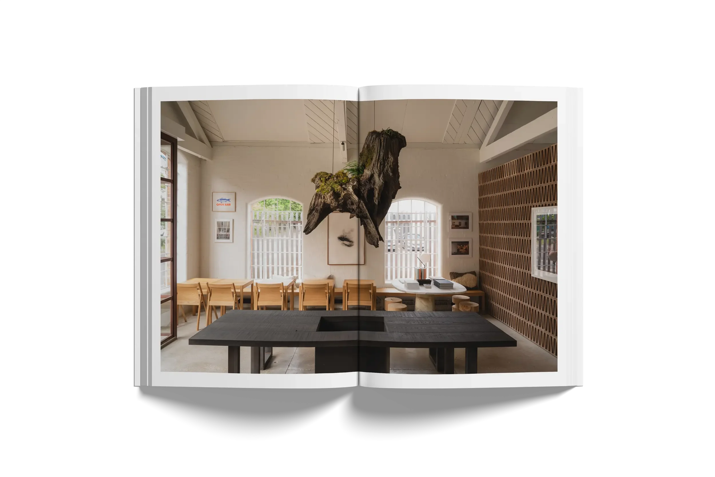 Our showroom in Poole, Dorset features modern design with carefully chosen architectural interiors, Nikari's Seminar KVP oak table, and Mutina's Celosia Stone tile.