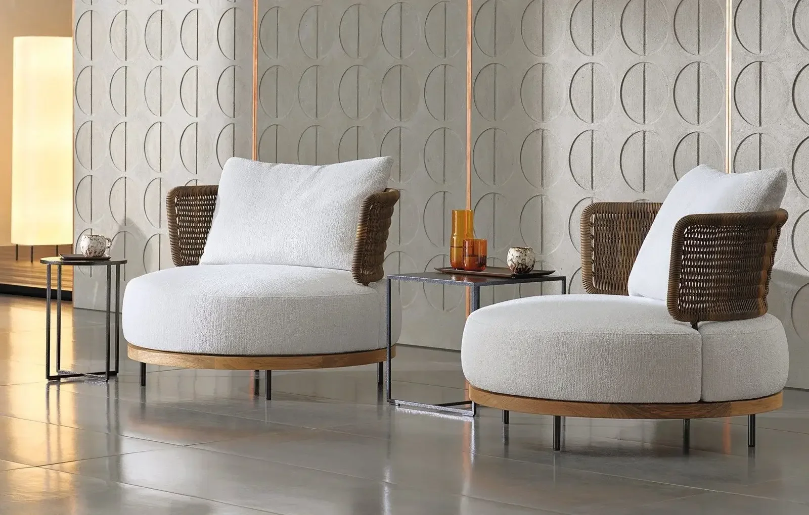 Minotti Quadrado outdoor armchairs designed by Marcio Kogan, featuring modular seating and contemporary design, supplied by Abitalia South Coast in Dorset, Hampshire, and Surrey.