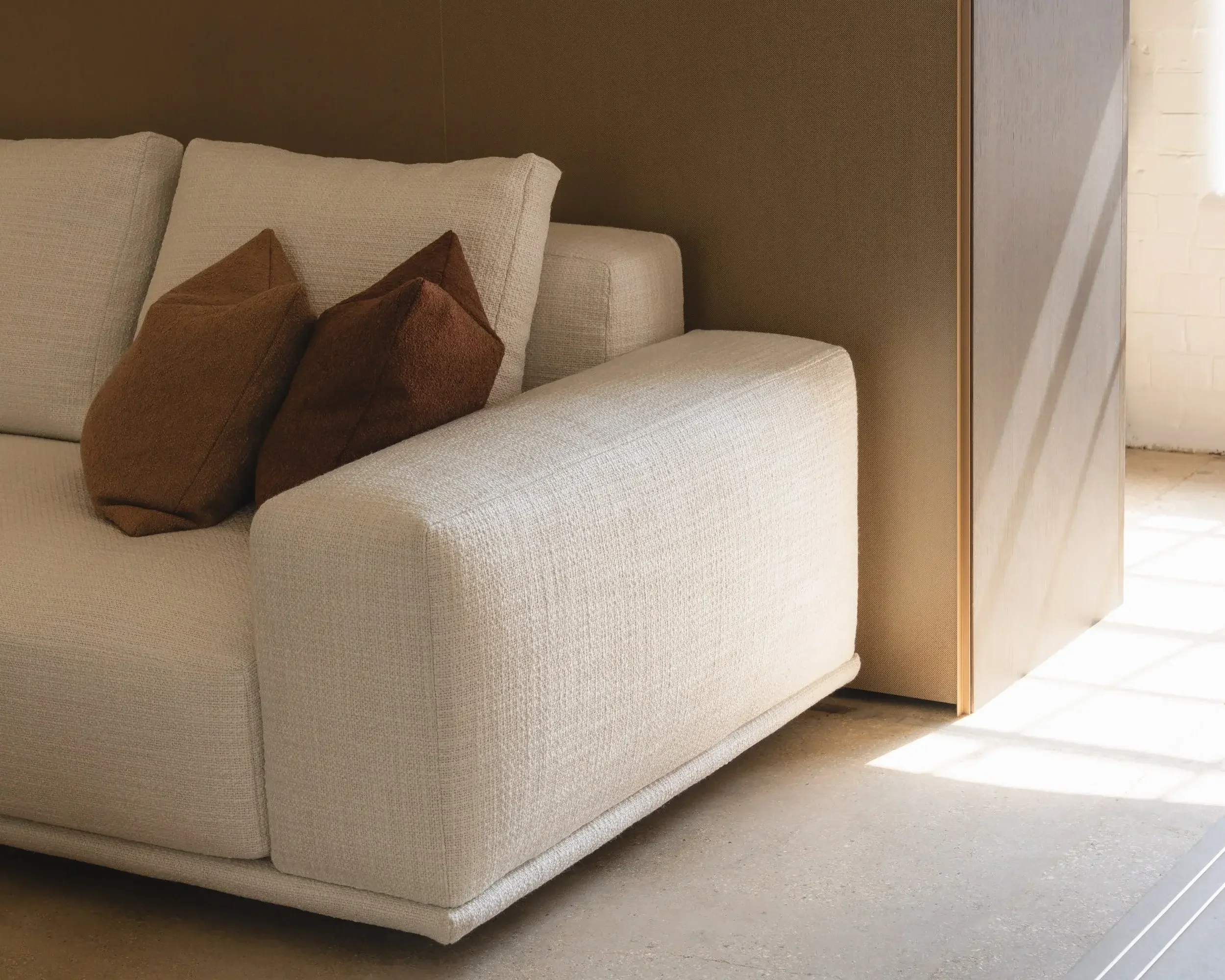 Luxury Verzeloni sofa with white arms and soft upholstery, showcasing clean lines and modern design for contemporary living rooms.