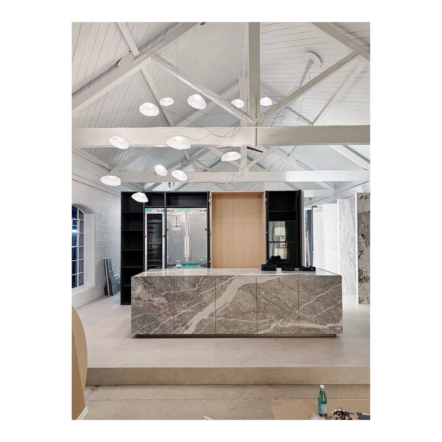 WIP. The Fiori di Pesco, from the Italian meaning peach tree. Delicate peach colours with greys and pinks running through the classic italian marble. The @bocci 73 Series cascades through the space above, in a sculptural form above the soon to be ins