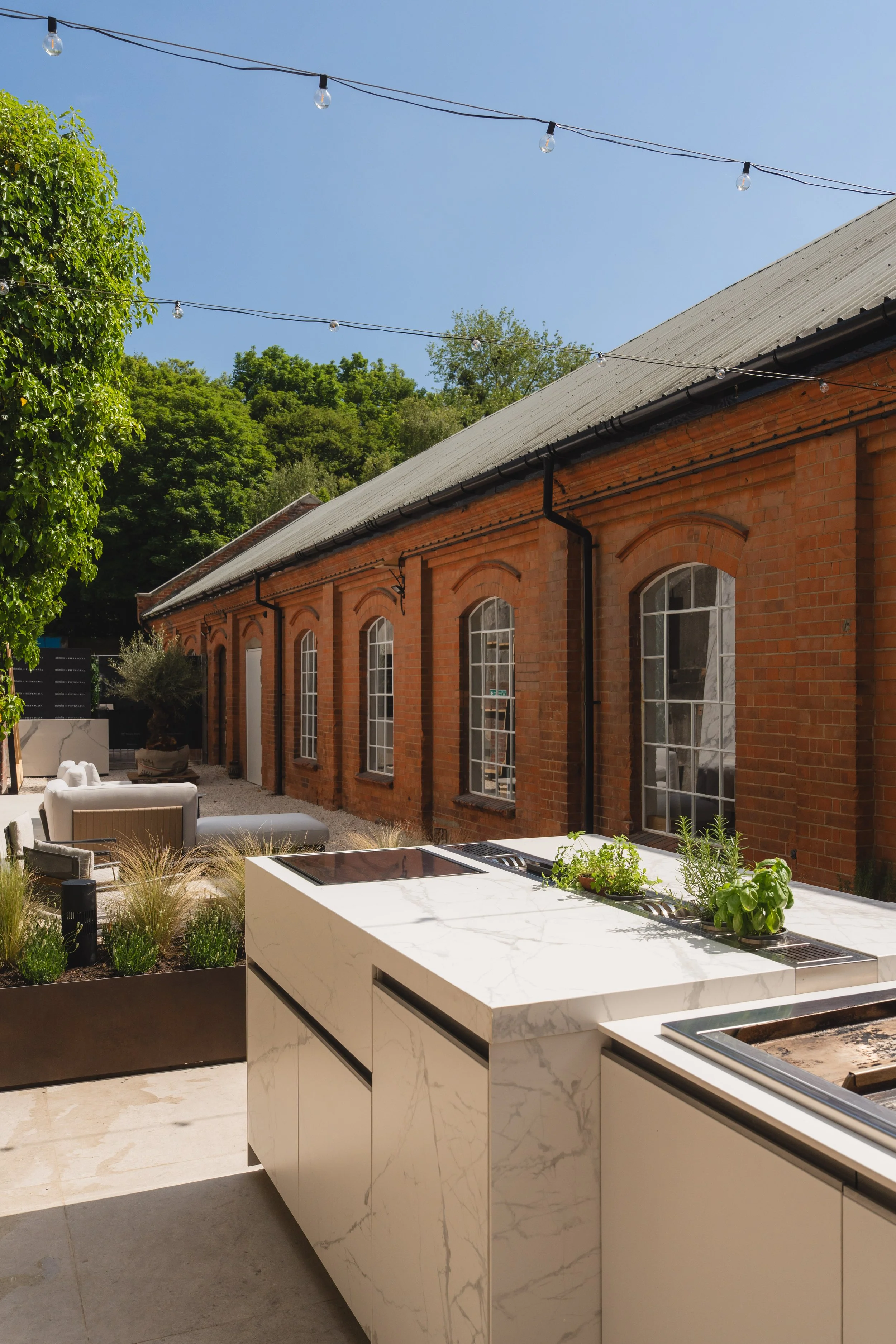 Minimalist outdoor kitchen island designed for open-air entertaining and everyday use.