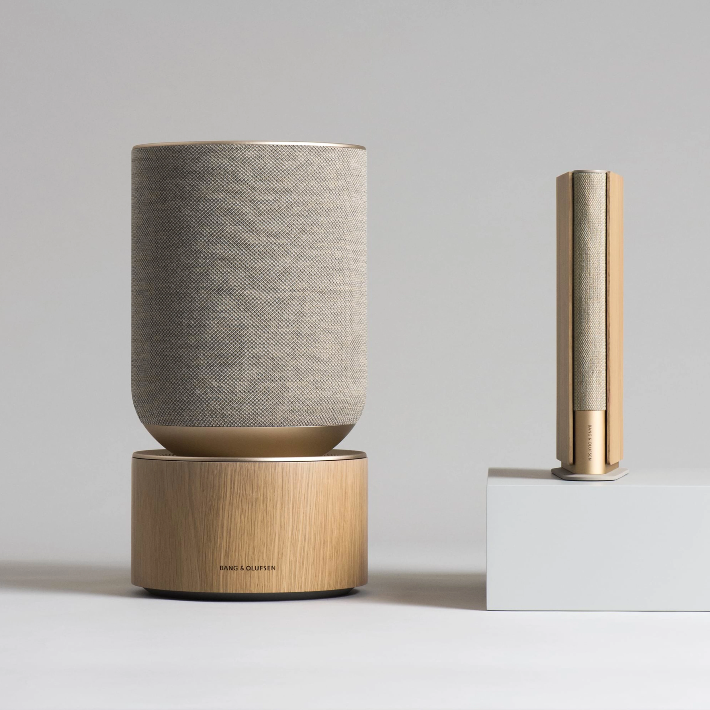 Beosound Balance speaker integrated into home entertainment system.