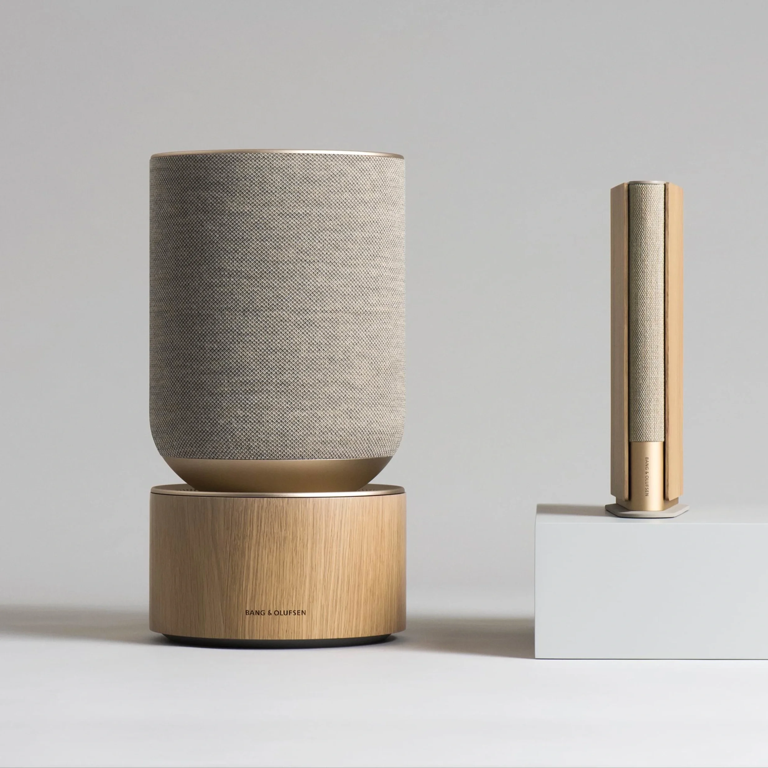 Beosound Balance speaker integrated into home entertainment system.