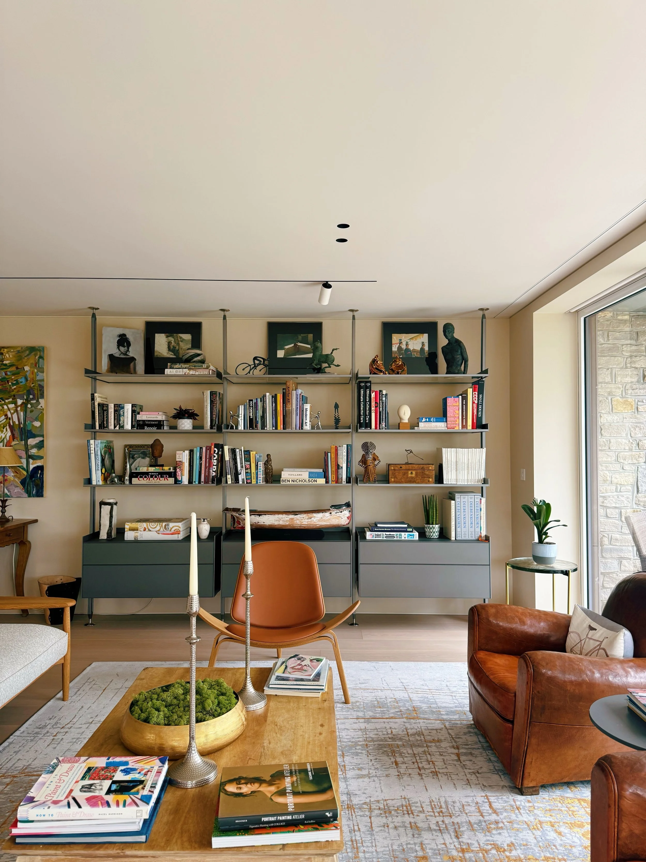 The engineer and the artist. Our first project where every aspect of this apartment was designed and installed by Abitalia. Our brief was to reconfigure a hectic floor plan into a calm, considered home - a place to house a lifetime of travel, art and