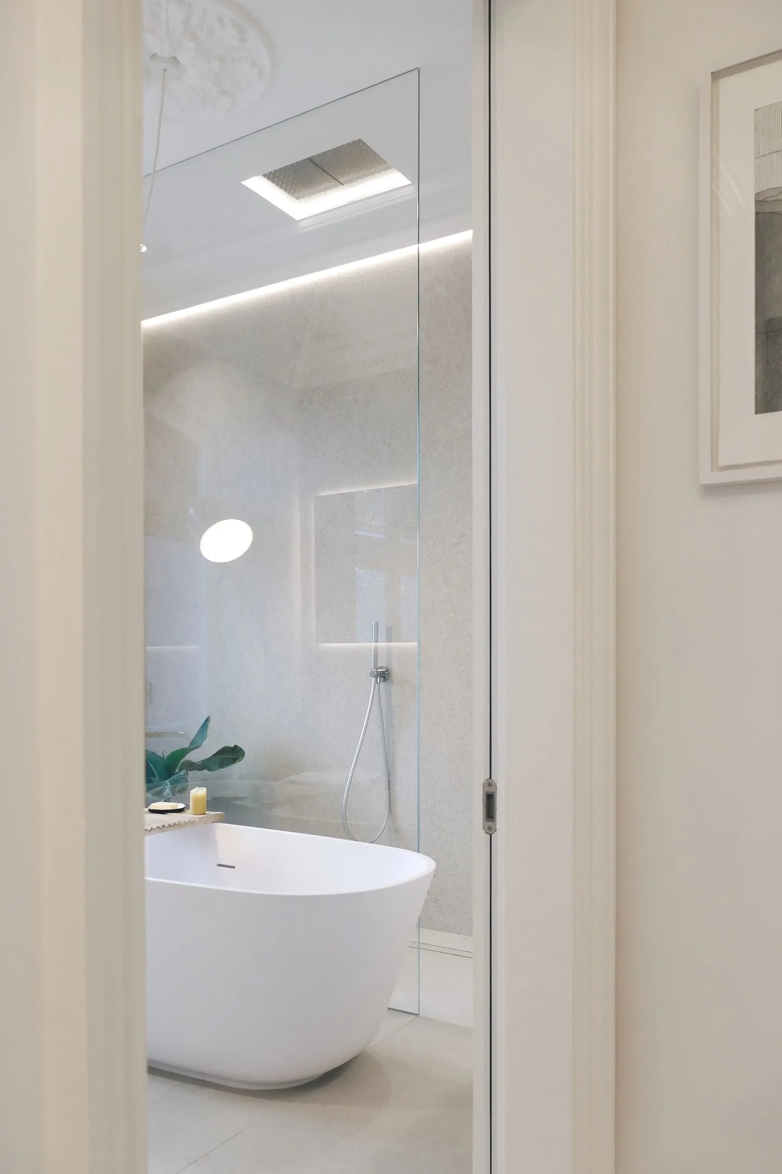 Antonio Lupi Baia freestanding bathtub in a luxury bathroom setting at the Abitalia South Coast showroom in Dorset, UK.