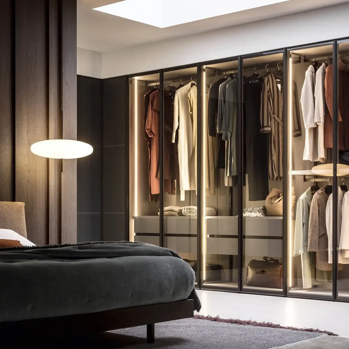 Wardrobe designed with LED lighting and pull-outs by novamobili via Abitalia South Coast across Hampshire, Dorset, Surrey and wider UK.