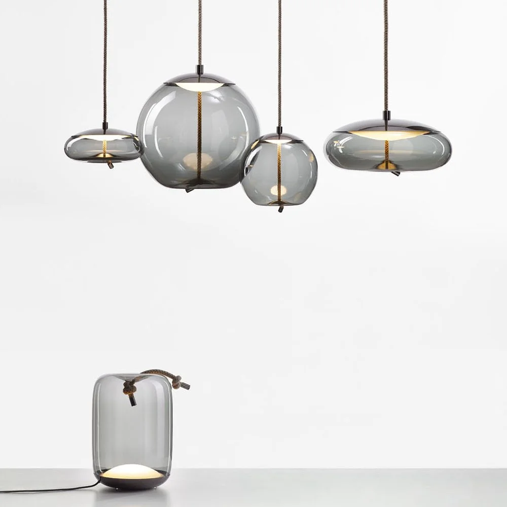 Brokis Knot Series lighting featuring hand-blown glass shades paired with natural fiber rope, designed by Chiaramonte & Marin, supplied by Abitalia South Coast in Dorset, Hampshire, and Surrey.