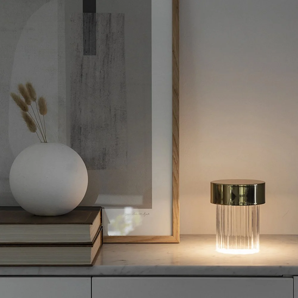 Flos Last Order Fluted Portable Table Lamp by Michael Anastassiades, featuring a fluted glass base, metal top, and integrated LED, supplied by Abitalia South Coast in Dorset, Hampshire, and Surrey