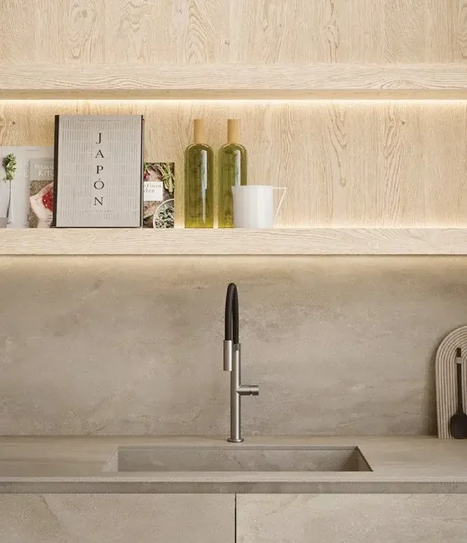 Modern Zampieri kitchen with sink and wooden shelves in Inalco porcelain tiles, designed by Abitalia South Coast in Dorset, Hampshire, and Surrey.