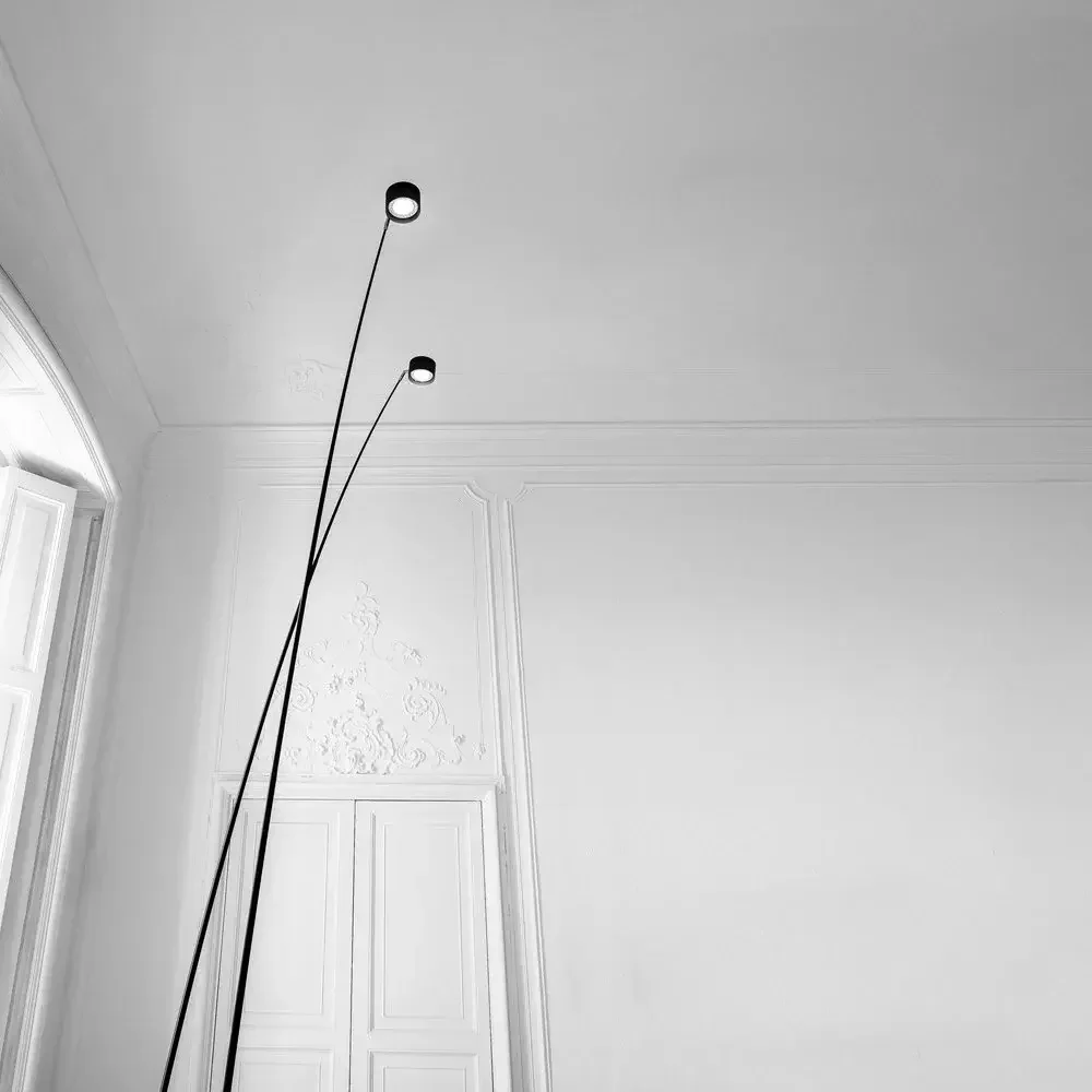 Davide Groppi Sampei Floor Lamp featuring a slender telescopic stem inspired by fishing rods, supplied by Abitalia South Coast in Dorset, Hampshire, and Surrey.