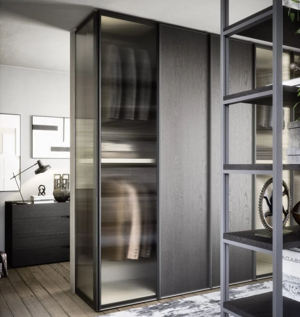 Luxury designer wardrobe by Novamobili with oxidised bronze frame and smoked glass doors.