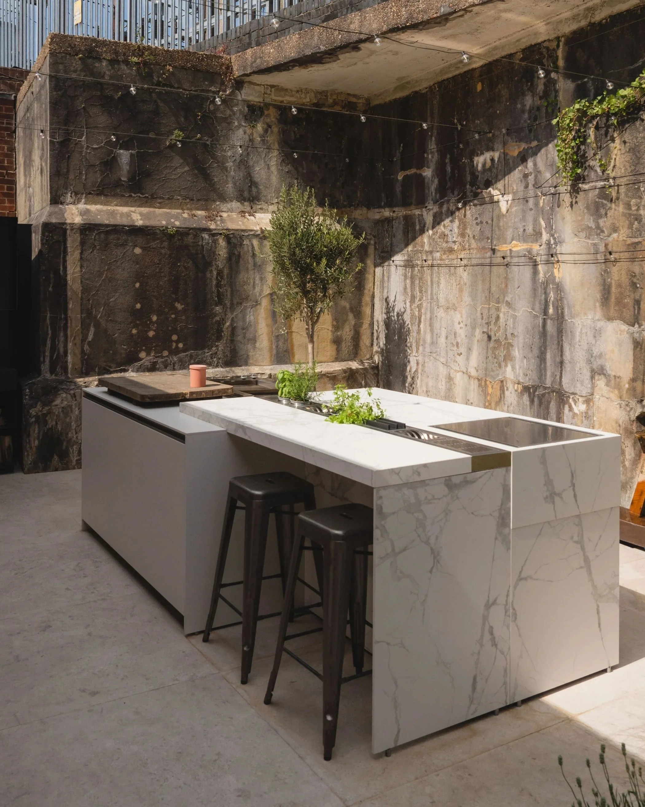 Loggia Out by Zampieri modular outdoor kitchen with linear design and seamless integration into terrace space.