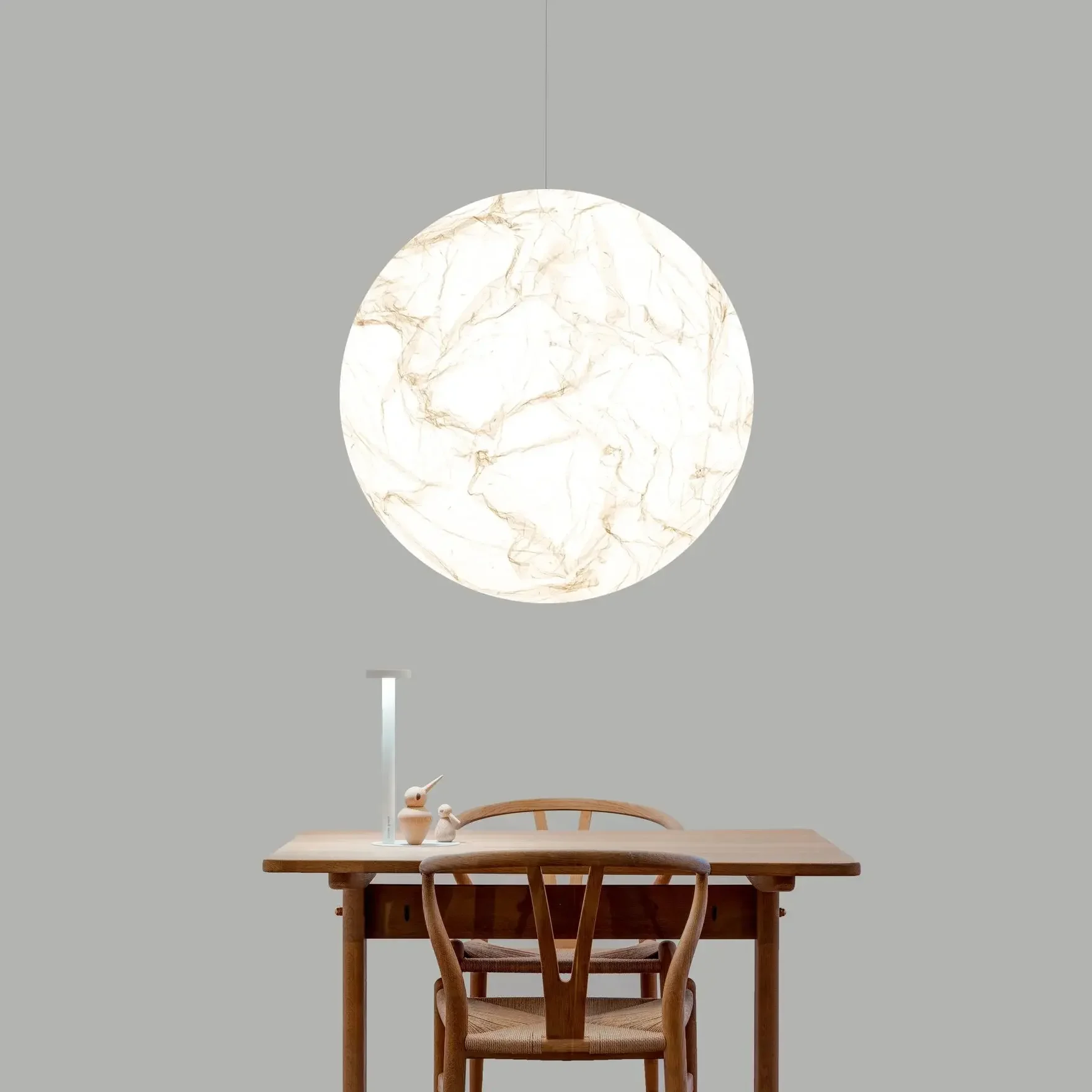 Handmade Japanese paper pendant lamp by Davide Groppi with sculptural design.
