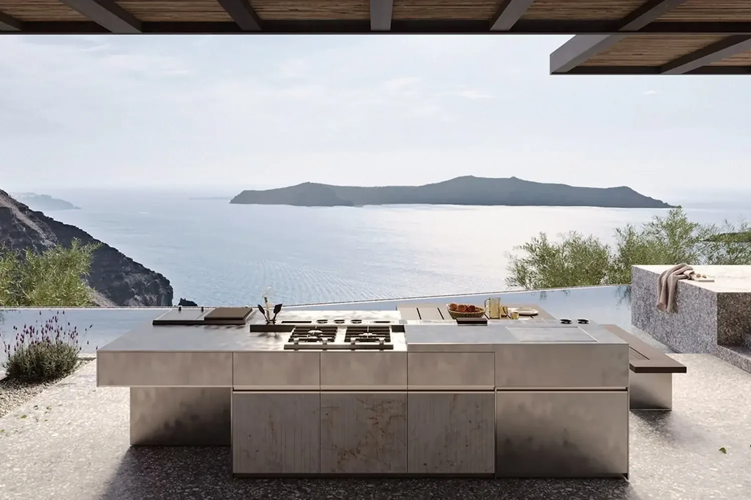 Modern outdoor kitchen featuring a porcelain island and stove, by Zampieri designed and supplied by Abitalia South Coast in Dorset, Hampshire, and Surrey
