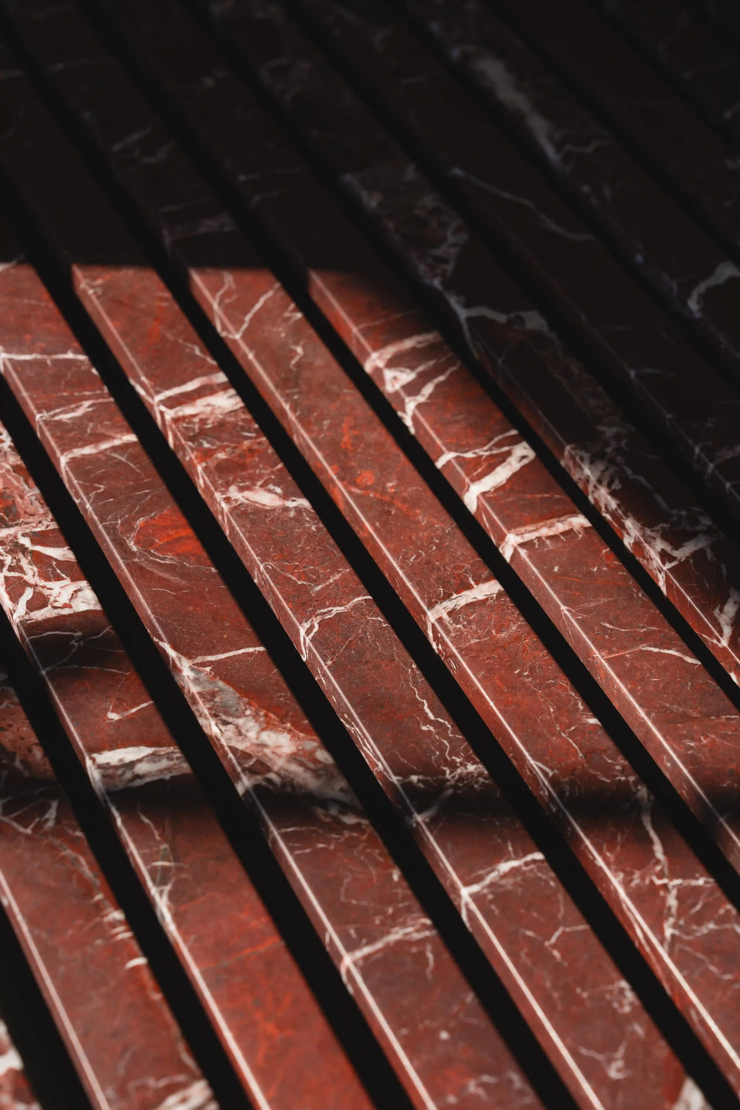 Close-up of marble veining on Serafini’s floating Piano sink.