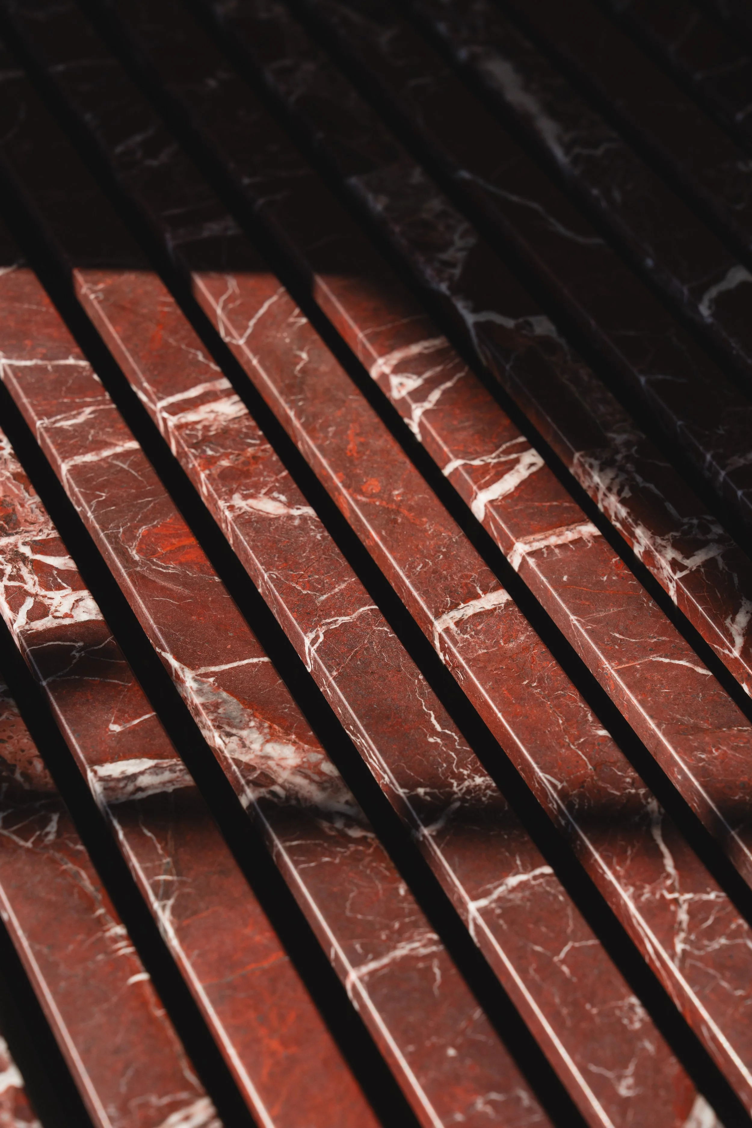 Close-up of marble veining on Serafini’s floating Piano sink.