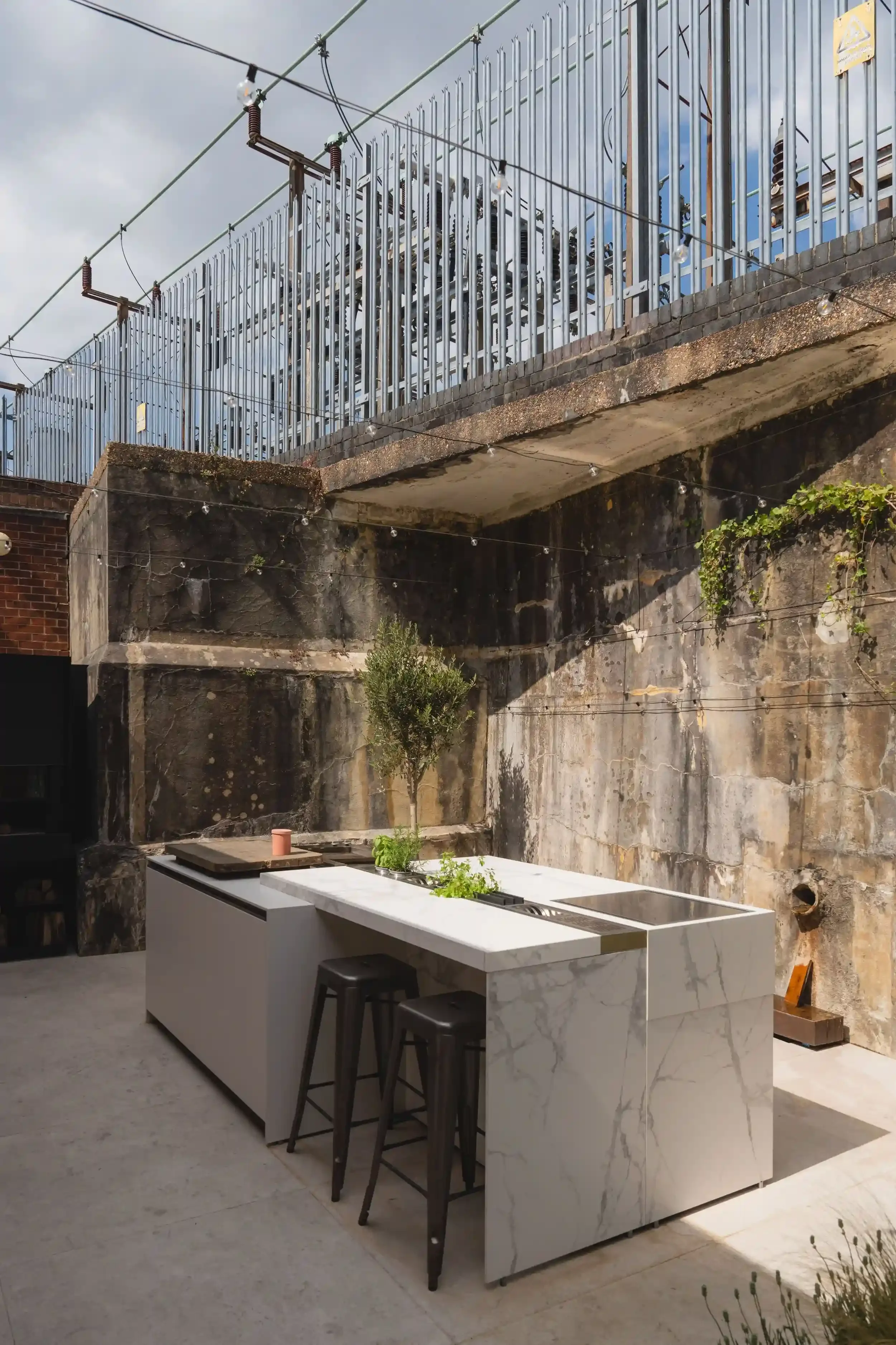 Loggia Out by Zampieri modular outdoor kitchen with linear design and seamless integration into terrace space.