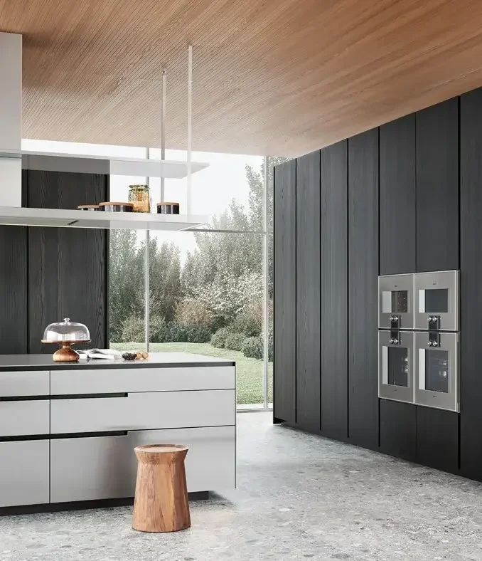 Modern Poliform Phoenix kitchen with wooden cabinets and built-in Gaggenau appliances, designed by Abitalia South Coast in Dorset, Hampshire, and Surrey.