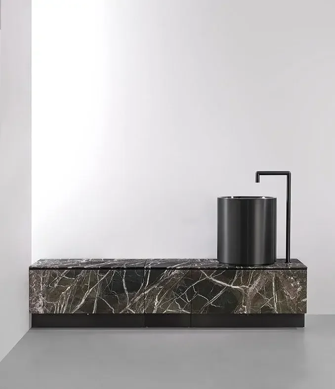 CEA Design luxury taps with black porcelain vanity and round black sink, designed by Abitalia South Coast in Poole, Dorset, UK.