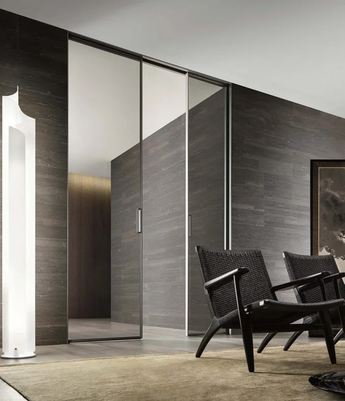Rimadesio Zen interior door, designed by Giuseppe Bavuso, available in hinged and sliding versions, supplied by Abitalia South Coast in Dorset, Hampshire, and Surrey.