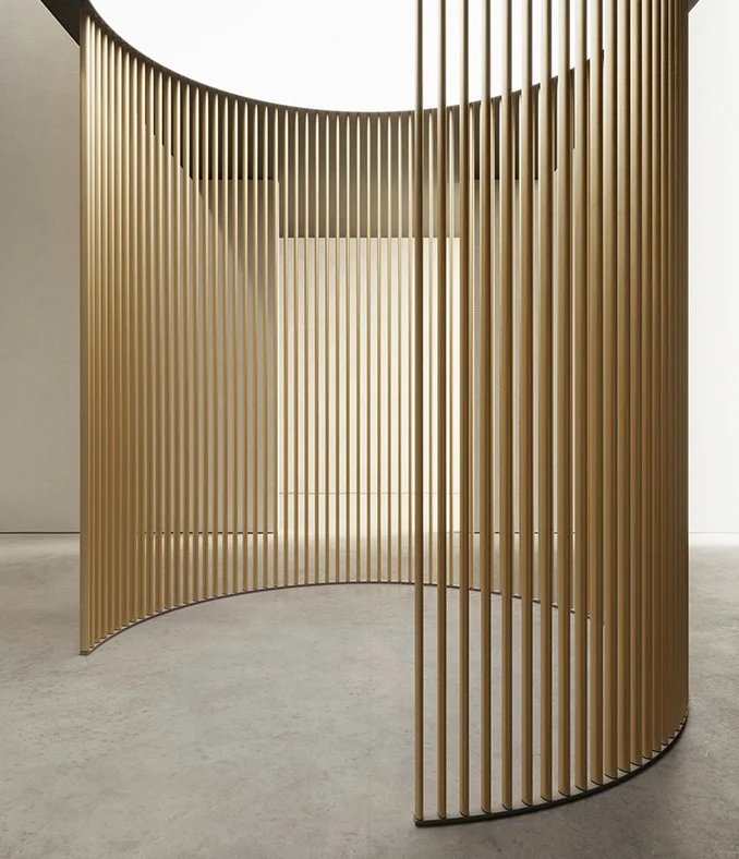 Dresswall Stripes EL35/70-D aluminium curved partition wall system with modular slats for architectural interiors, supplied across Dorset, Hampshire and Surrey.