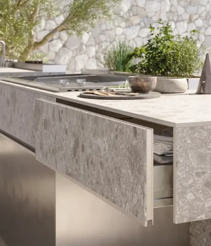Zampieri kitchen island featuring countertop and cabinetry in Iseo Inalco porcelain stoneware with smoked oak texture, supplied by Abitalia South Coast in Dorset, Hampshire, and Surrey.