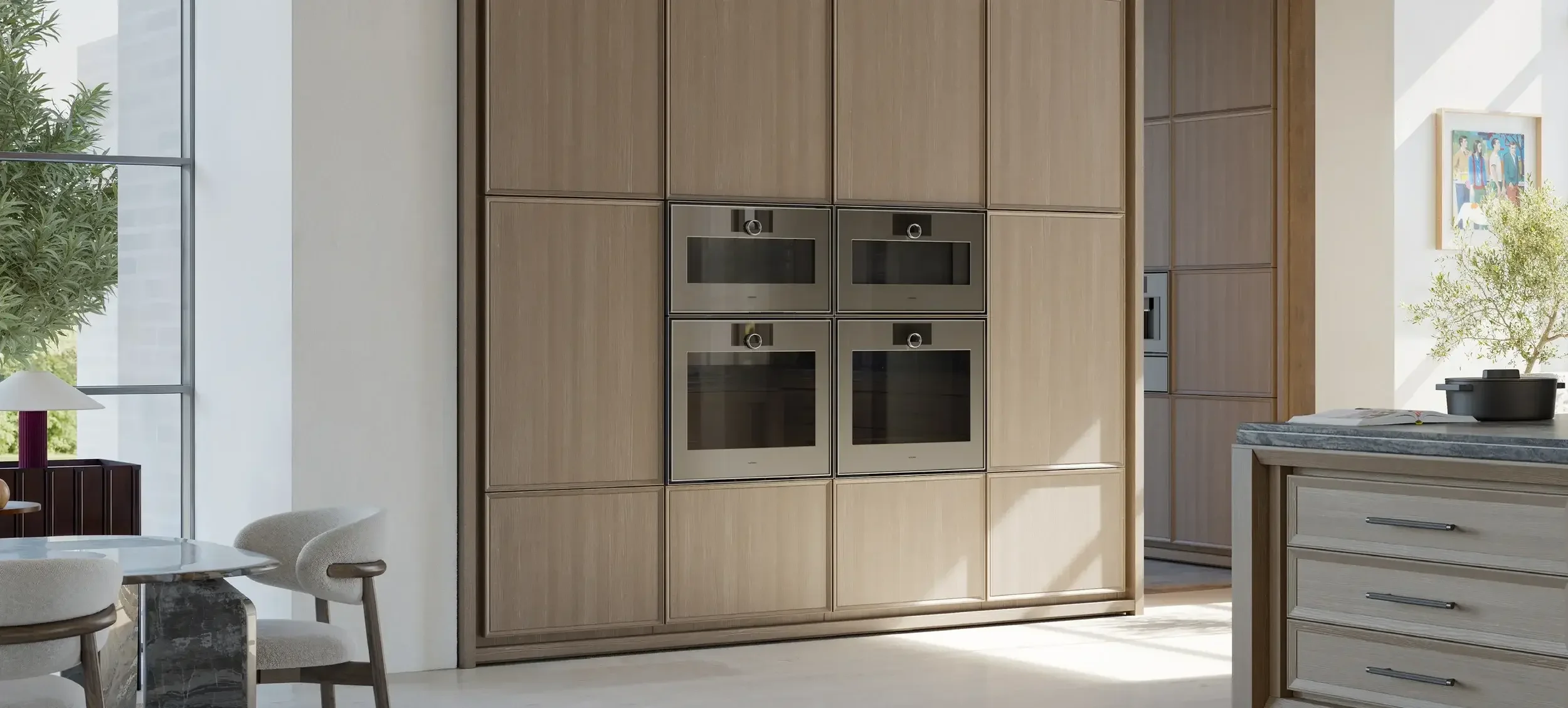 Gaggenau kitchen appliances including oven, cooktop, and integrated refrigeration in sleek contemporary interior.